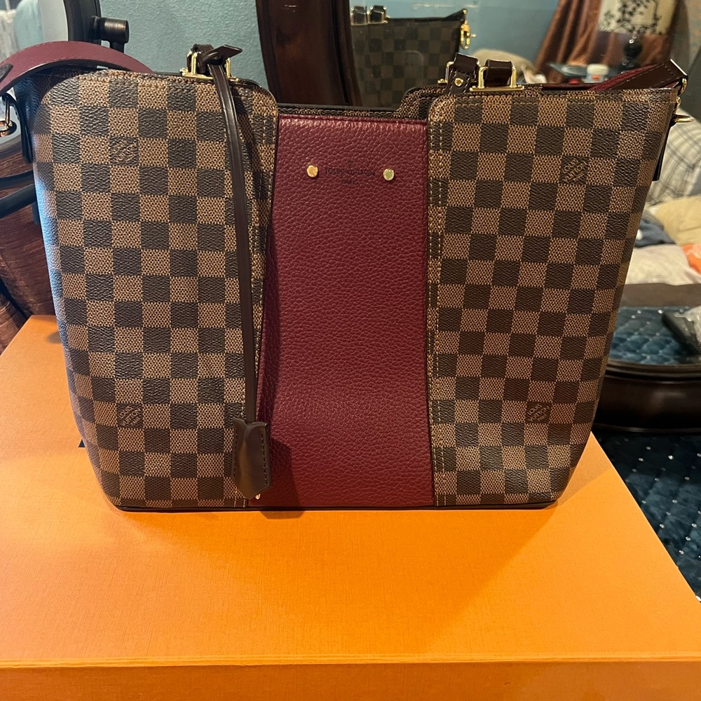 Louis Vuitton
Jersey Damier Ebene Burgundy Canvas Tote